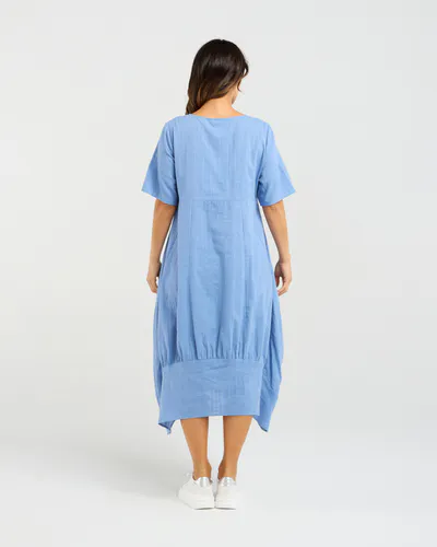 Model wearing Blue Selena Dress By Seduce Available at Beetees Nelson